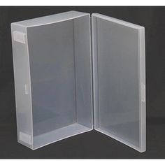 an open white plastic box on a black background