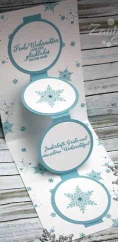 three cards with snowflakes on them