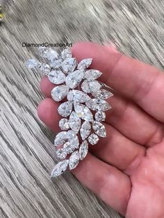 Pear Marquise & Round Cut Moissanite Diamond Stunning Brooch, Antique Brooch For Women, 10K White Gold Brooch, Wedding Brooch, Gift For Her Detail about stones Moissanite & Simulated Stone: ----------------------------- ➠Stone Shape : Pear, Marquise, Round ➠Stone Size : 7x5 mm, 8x4 mm, 4 mm ➠Weight: 17 TCW ➠Color: Colorless ➠Cut: Excellent ➠Clarity: VVS ✍This Listing's images are only for Imagin about this item. This is all our photography. If you place the order then the same item we can make i White Diamond Wedding Brooches, Exquisite White Wedding Brooches, Luxury Diamond White Brooches For Wedding, White Brilliant Cut Brooches For Wedding, White Brilliant Cut Wedding Brooches, White Gold Brilliant Cut Brooches For Wedding, White Gold Brilliant Cut Wedding Brooch, White Gold Brilliant Cut Wedding Brooches, Luxury Wedding Brooch With Single Cut Diamonds