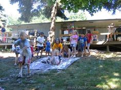 a group of children playing in the yard