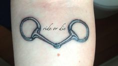 a tattoo on the arm that says ride or die with two linked links in it