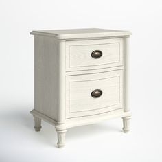 a white wooden cabinet with two drawers