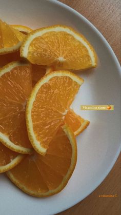 sliced oranges on a white plate ready to be eaten