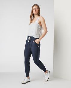 Meet the pants you’ll never want to take off, now in a longer inseam. The Performance Joggers have a slim but relaxed fit with a slightly cropped leg, side pockets and a drawstring. Designed with our softest premium DreamKnit™ stretch fabric, they’re your new go-to. | Vuori Performance Jogger Pants - Long | Midnight Heather | XS Vuori makes premium performance apparel inspired by the active Coastal California lifestyle; an integration of fitness, surf, sport, and art. Breaking down the boundarie Coastal California, California Lifestyle, Performance Outfit, Skirt Leggings, Sweatshirt Shirt, S Models, Board Shorts, Jogger Pants, Short Tops