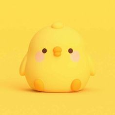 a little yellow bird sitting on top of a yellow floor next to a white wall