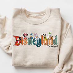 Disneyland The Original Sweatshirt, Magical Land Sweatshirt, Disneyland Shirt, Mickey Minnie Sweatshirt, Family Disneyland Vacation Shirts Gifts For Family By Miosama.  best day ever shirt,  disneyland trip 2024,  disney shirt,  magical kingdom, disneyland sweater,  disneyland tee,  mickey minnie shirt,  retro disney,  disneyland shirt,  retro disneyland,  disneyland tshirt,  mickey sweatshirt,  disney sweatshirt ... Disneyland Sweater, Retro Disneyland, Disneyland Sweatshirt, Disney Magical, Disneyland Shirt, Mickey Sweatshirt, Disney Sweatshirt, Disneyland Vacation, Retro Disney