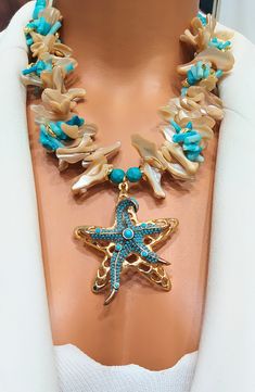 Adorned with a Starfish: Handmade Mother of Pearl and Turquoise Stone Necklace ⭐ Gemstone Necklace / Beaded Necklace / Gifts for Loved / Women Jewelry This handcrafted necklace embodies the enchantment of nature and the elegance of starfish. Adorned with a large starfish detail dangling at the end, it offers a shimmering and captivating look at every turn. 🐚 Radiance of Mother of Pearl: Mother of pearl is renowned as nature's delicate gift from the sea. The mother of pearl detail in this neckla Handmade Bohemian Starfish Jewelry, Bohemian Jewelry With Starfish Charm For Jewelry Making, Bohemian Starfish Charm Jewelry For Jewelry Making, Bohemian Starfish Charm Jewelry For Crafting, Handmade Starfish Beaded Necklaces As Gift, Unique Starfish Jewelry As A Gift, Bohemian Starfish-shaped Turquoise Jewelry, Bohemian Turquoise Starfish Jewelry, Bohemian Beaded Necklaces With Starfish Charm For Gifts