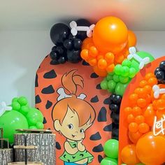 there are balloons and decorations on the wall