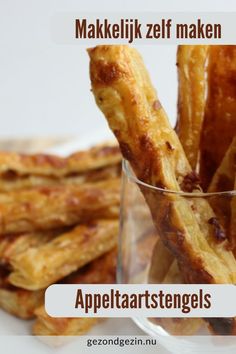 some kind of appetizers sitting in a glass on a white surface with the words appetizers written below it