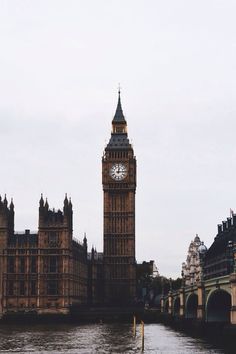 the big ben clock tower towering over the city of london