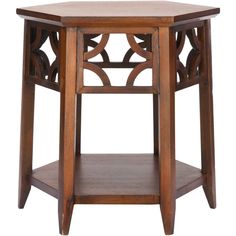 a wooden table with an intricate design on the top and bottom shelf, against a white background