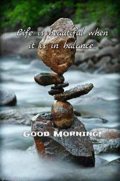 rocks stacked on top of each other with the words, life is beautiful when it's in balance