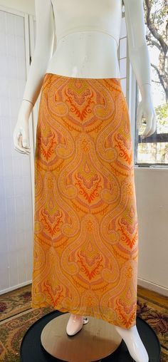 "mannequin 4   BURBERRY, Italy lined maxi skirt, 8. Good condition. 8  W; 32\"  L: 37\"" Flowy Maxi Skirt With Long Inseam For Spring, Flowy Lined Maxi Skirt, Fitted Orange Maxi Skirt, Elegant Fitted Orange Maxi Skirt, Vintage Flowy Lined Maxi Skirt, Fitted Full-length Lined Maxi Dress, Fitted Full-length Maxi Dress With Lined Skirt, Vintage Relaxed Fit Lined Maxi Skirt, Vintage Fitted Lined Maxi Skirt