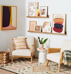 a living room filled with furniture and pictures