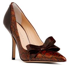 Striking stiletto leather pump. This stunner is crafted in embossed print crocodile leather and sports an edgy leather side bow. A must! This dressy style will complement jeans, pants, skirts and dresses alike! Perfect for a garden or pool party, nice evening, date night, New Year's Eve, wedding, Valentine's Day, holidays, or to elevate your work outfit. This shoe is guaranteed to turn heads! 4"=10mm heel 6mm = 0. 23"memory foam insole. Leather lining & sole. Slip-On Designer style handmade in I Work Pumps, Cute Shoes Heels, Circular Motion, Black Leather Pumps, Dressy Fashion, Comfortable Heels, Crocodile Leather, Boot Pumps, Stiletto Pumps