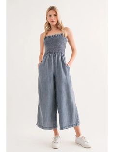 Introducing our Vintage Washed Tencel Jumpsuit - a chic one-piece featuring a smocked bodice, wide leg, side pocket, adjustable strap, and made from 100% tencel for comfort and style. Sleeveless Cotton Jumpsuit With Smocked Bodice, Cotton Sleeveless Jumpsuits And Rompers With Smocked Bodice, Casual Strapless Jumpsuit With Elastic Waistband, Casual Strapless Sleeveless Jumpsuit With Elastic Waistband, Spring Cotton Jumpsuit With Smocked Bodice, Spring Cotton Jumpsuits And Rompers With Smocked Bodice, Casual Strapless Jumpsuit With Smocked Back For Summer, Summer Casual Strapless Jumpsuit With Smocked Back, Casual Wide Leg Jumpsuit With Smocked Bodice