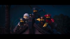 the lego movie characters are riding on top of each other