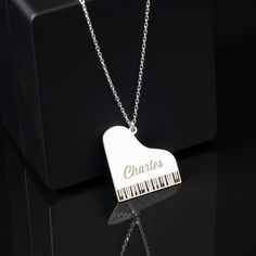 "Custom Piano Necklace in Sterling Silver, Piano Keyboard Pendant is made by hand in our workshop with care. All our jewelry is the most elegant choice for the Bridesmaids, friends, your loved ones and for yourself. Custom Piano Necklace in Sterling Silver, Piano Keyboard Pendant * Material: High Quality Solid 925 Sterling Silver. * Finish: Sterling Silver ∙ Gold ∙ Rose Gold. * All our jewelry is custom made by hand with care in our workshop.  HOW TO ORDER ❓ * Select your necklace COLOR. * Choos Piano Necklace, Piano Player, Piano Keyboard, Name Necklace, Sterling Silber, Solid 925 Sterling Silver, Gold Rose, Jewelry Gift, Or Rose