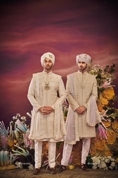 Make a grand statement on your special day with a luxurious Sherwani crafted from premium fabrics (like silk, brocade, or georgette) for ultimate comfort and sophistication. Our collection boasts a variety of designs to suit every taste: Classic elegance: Opt for a timeless Sherwani with intricate embroidery on the collar or cuffs. Modern flair: Go for a Sherwani with a unique neckline or a trendy color palette. Regal opulence: Choose a Sherwani with rich embellishments like zardozi work for a t Fitted Sherwani With Pallu For Ceremony, Traditional Ceremony Sets With Drape, Traditional Kurta For Eid Ceremony, Elegant Sherwani With Pallu For Ceremony, Gold Traditional Drape Wear For Ceremony, Traditional Drape Sets For Eid Ceremony, Eid Ceremony Traditional Kurta, Eid Ceremony Sets With Traditional Drape, Traditional Sherwani With Pallu For Ceremony