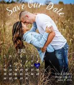 a man and woman kissing in the middle of a field with calendars on it