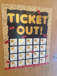 a door with a sign that says ticket out and stars on the doorsills