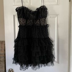 This Is Still Full Price On The Website! Black Color Is Sold Out & Hard To Find!! Now This Is True Love. Super Feminine Lace Mini Dress Featuring Flocked Dot Ruffled Tulle And A Sweetheart Neckline. Skirt Is Tutu-Style With Contrast Velvet Detailing And Adjustable Shoulder Straps. For Love & Lemons Runs Small As A Brand. So Size Large Is More Your Typical Medium. For Love & Lemons A-Line Dress Lace Flocked Dot Ruffle Tulle Flocked Dot Detail Sweetheart Neckline Tutu Skirt Contrast Velvet Taping Black Mini Dress With Ruffled Straps For Party, Night Out Dress With Ruffles And Sweetheart Neckline, Black Dress With Sweetheart Neckline And Ruffle Hem, Black Strapless Dress With Ruffle Hem, Black Flirty Dress With Ruffled Straps, Black Mini Dress With Ruffled Straps For Night Out, Black Dress With Ruffled Straps, Black Dress With Ruffled Straps For Night Out, Flirty Black Dress With Ruffled Straps