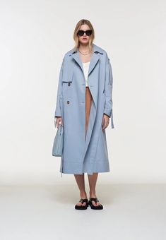 This season our signature Kimmi Trench block moves into new pastel shades. Double breasted oversized trench coat with adjustable sleeve detail. Made with a high quality soft cotton blend and features contrast stripe lining. Trench Coats Women Outfit, Blue Trench Coat, Grey Trench Coat, Coats Women, Women Outfit