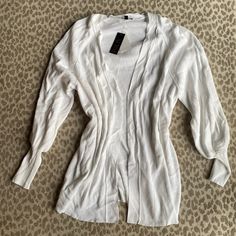 Nwt Really Soft And Versatile Ribbed White Open Cardigan From Afrm. This Can Be Worn Over Just About Anything- Jeans, Scrubs, Dresses, Workout Clothes, Leggings. You Can’t Go Wrong With This. The Sleeves Are Fitted At The Wrist For A More Polished Look. Size Is Xs/S Bc Of The Open Fit & Stretch (Could Fit A M As Well). Hits Past The Hip. This Is A Staple Piece You’ll Reach For Over & Over! Would Also Make A Great Gift. New To Poshmark? Sign Up With Code “Gracebgreene” For $10 Off Your First Purc White V-neck Outerwear For Layering, Casual Fitted Open Front Tops, White Stretch Cotton Cardigan, Fitted Open Front Cardigan For Day Out, White V-neck Cardigan For Loungewear, Open Front Knit Top For Spring, Chic White Ribbed Outerwear, Spring Open Front Knit Tops, White Ribbed Casual Cardigan