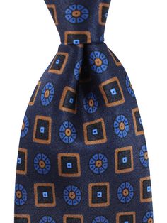 Borrelli Ties | Borrelli Luigi Borrelli Authentic Luigi Borrelli tie, dark blue / brown geometric pattern, printed silk, hand made in Italy. Luigi Borrelli Napoli men collection, sartorial quality men designer neckties at outlet prices. Color: Dark Blue / Brown Fabrics: 100% Silk Size: Width 8cm / 3.15", Regular Length 58" Brand: Luigi Borrelli Original Luigi Borrelli Gift Box Upon Request Hand Made in Italy Genuine / Authentic / Brand New Product Code: borr221026 Luxury Blue Ties For Business, Luxury Blue Suit And Tie Accessories For Office, Luxury Patterned Ties For Business, Luxury Blue Silk Ties, Luxury Patterned Business Ties, Luxury Brown Suit And Tie Accessories For Semi-formal Occasions, Luxury Brown Suit And Tie Accessories For Business, Brown Fabrics, Tie Matching