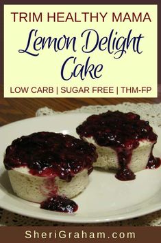 two lemon delight cake on a plate with the title overlay reads trim healthy mama lemon delight cake low carb sugar free tim - f