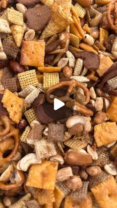 a mixture of cereal, nuts, and pretzels is shown in this image