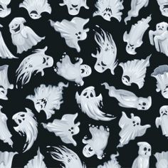 a black and white background with ghost faces on it's sides, all in different shapes and sizes