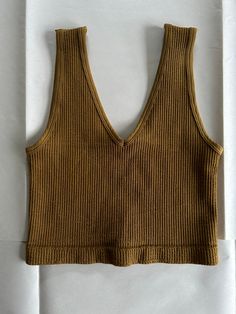 Our Dawn tank is a high quality seamless ribbed v neck brami in a beautiful olive gold color Cheap Chic Brown Tank Top, Cheap Trendy V-neck Knit Top, Affordable Versatile Summer V-neck Top, Cheap V-neck Knit Top, Cheap Brown Tank Top For Vacation, Affordable Chic Brown Tank Top, Cheap Trendy V-neck Tank Top, Cheap Solid V-neck Knit Top, Affordable Seamless V-neck Tops