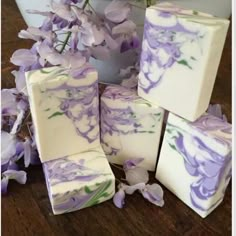 soap bars with purple flowers in the background