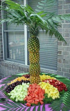 a palm tree made out of fruits and vegetables