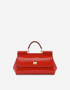 Elongated Sicily bag in shiny calfskin: Red Front flap with hidden double magnetic fastening Logo tag featuring two metal plating finishes Top handle and adjustable, detachable strap in polished calfskin Printed fabric lining and flat pocket Item comes with a branded dust bag Measurements: H18 x W29 x D10 cm Made in Italy Luxury Glossy Shoulder Bag For Business, Luxury Glossy Finish Business Shoulder Bag, Luxury Glossy Finish Shoulder Bag For Business, Elegant Glossy Finish Shoulder Bag For Travel, Elegant Bags With Glossy Finish And Double Handle, Elegant Double Handle Bags With Glossy Finish, Designer Formal Bags With Glossy Finish, Formal Bags With Glossy Finish, Designer Glossy Finish Formal Bags