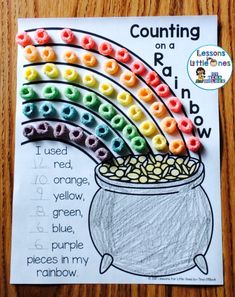 a st patrick's day activity for kids with rainbows in a pot and the words counting on a rainbow