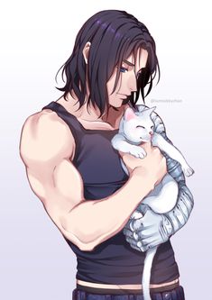 a man holding a cat in his arms