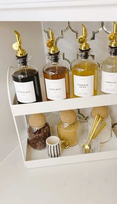 an open cabinet filled with different types of bottles and containers on top of each other