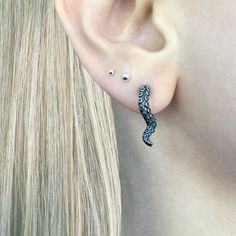 Add a touch of edginess to your wardrobe with our Octopus Tentacle earrings. The unique ear jacket design features intricate octopus tentacle, making a bold statement. Sold as pair Material : 316 Stainless steel Size: Front tentacle 3/4 inch, Back tentacle 1 1/4 inches Closure: push back Listing for pair of earrings only Tentacle Earrings, Edgy Earrings, Octopus Tentacles, Ear Jacket Earring, Gothic Earrings, Ear Jacket, Cuff Rings, Jacket Design, Ring Necklace