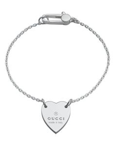 From the Trademark Collection, this sweet sterling silver bracelet features a woven chain with engraved logo heart charm. Designed by Gucci. Gucci Silver Bracelet, Gucci Bracelet, Sterling Silver Heart Bracelet, Dr Shoes, Silver Heart Bracelet, Sterling Silver Heart Pendant, Heart Chain, Silver Heart Pendant, Bracelet Online