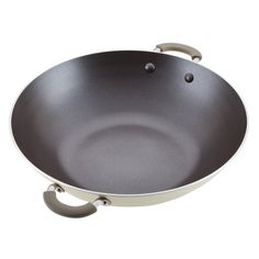 an empty frying pan on a white background