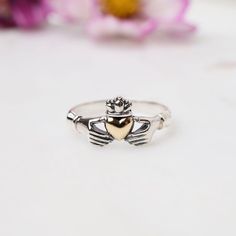 RNG Silver Claddagh Ring with Bronze Heart Symbolic Heart Shaped Wedding Rings, Symbolic Heart-shaped Wedding Ring, Symbolic Heart-shaped Promise Ring, Promise Ring With Crown Design, Claddagh Ring Meaning, Symbol Of Friendship, Silver Claddagh Ring, Friendship Symbols, Claddagh Ring