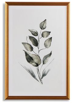 a watercolor painting of leaves in a gold frame on a white wall with a brown border