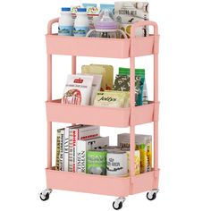 a pink cart filled with lots of different items