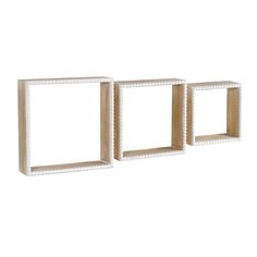 three white wooden shelves with beaded trim