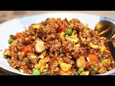 a white bowl filled with rice and vegetables