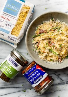 pasta, seasoning and other ingredients on a marble table