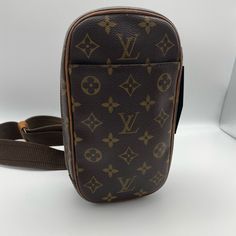 Lv Vintage Mono Pochette Gange Cross Body 5x2x9 Has Adjustable Strap. Inside Is Clean. Inside Front Pocket Code Is Ca0053. Has One Pocket On The Outside. Fits Some Larger Phones. All Closures Are Functional. Item Shows Signs Of Wear From Normal Use. Please Refer To Photos For Further Details. Item Is Available In Store Or On Our Website For $890. Watjp87408 Louis Vuitton Croisette, Lv Vintage Crossbody Bag, Louie Vuttion Key Pouch, Louis Vuitton Crossbody Bag, Louis Vuitton Favorite, Lv Pochette, Louis Vuitton Speedy 25, Louis Vuitton Crossbody, Studded Clutch