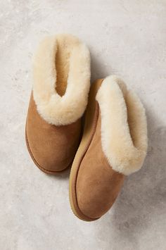 The Alyssa delivers a peak winter experience. Fashioned in 100% Australian Merino sheepskin upper, insole, and collar, these cozy shearling slippers feature a comfort foam midsole, while an exceptional Eva outsole with arch support gives you a stable base for standing and walking that never stops feeling great. The slip-on style makes these luxurious slippers easy to wear. Includes a memory foam midsole for luxurious comfort and durability. 1" heel. Slippers With Arch Support, Frozen Dog Treats, Soft Sole Slippers, Frozen Dog, Shearling Slippers, Bedroom Slippers, Sheepskin Slippers, Soft Slippers, Slippers Women